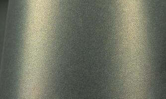 Paper texture with pearlescent gloss effect, glossy shimmer on warm yellowish and moss green surface photo