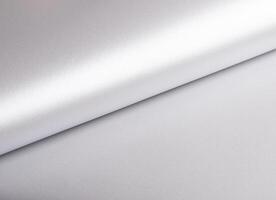 Silver paper texture with pearlescent gloss, sleek rolled design, and metallic platinum tones, photo