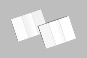 Two white paper sheets on a gray background photo