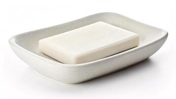 Soap bar resting in a soap dish.. photo