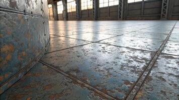 Closeup of a rusted and worn industrial floor with metal plates. photo