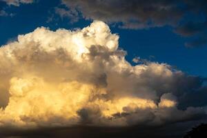 Multicolored sky with clouds and dramatic lighting. photo