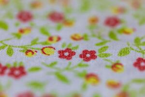 Full screen background of fabric with vintage print and soft texture selective focus photo