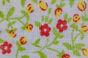 Full screen background of fabric with vintage print and soft texture photo