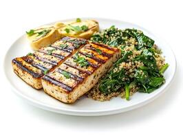 Grilled salmon with quinoa and spinach photo