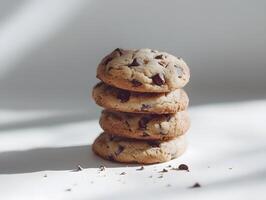 Stack of chocolate chip cookies on white background photo