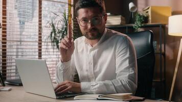 Caucasian guy worker agent employer working typing laptop in office business wave finger no stop gesture forbid salesman male deny sign man executive disapproval decline trader businessman rejecting photo