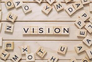 The blocks are scattered around the word, creating a playful photo
