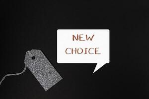 Tag with the word New Choice written on it photo