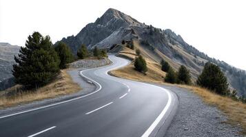 Scenic Mountain Road Winding Through Majestic Peaks photo