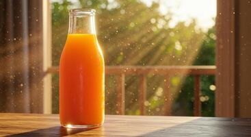 Fresh Orange Juice Bottle on Wooden Table with Sunlight Background photo