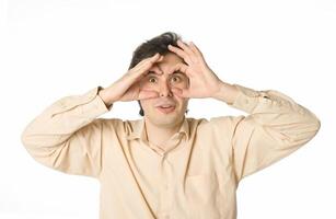 Man staring at something, over white photo