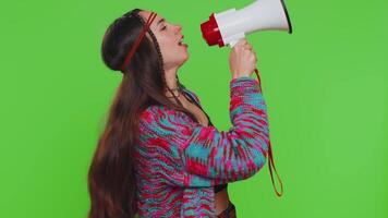 Woman talking with megaphone, proclaiming news, loudly announcing advertisement pointing empty place video