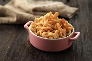 Lanting, Crispy Javanese Snack made from Cassava Flour, Savory and Garlic Flavor. photo