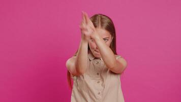 Young woman pointing around with finger gun gesture making choice, shooting killing with hand pistol video