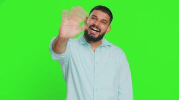 Happy man smiling friendly waving hands gesturing hello greeting or goodbye, meeting invitation video