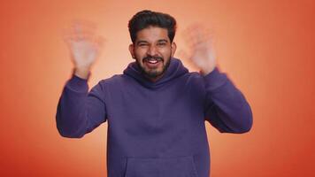 Man showing inviting gesture with hands, ask to join, beckoning to coming, gesturing hello goodbye video