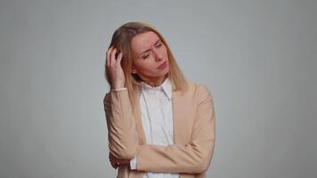 Woman feeling embarrassed about ambiguous question, having doubts, no idea, being clueless uncertain video