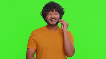 Man wearing headset freelance worker, call center, support service operator helpline communication video