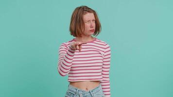 Woman pointing at her eyes and camera show I am watching you gesture spying watching on someone video