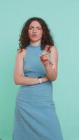 Woman reacting to unpleasant awful idea, dissatisfied, wave hand, shake head No, dismiss idea video