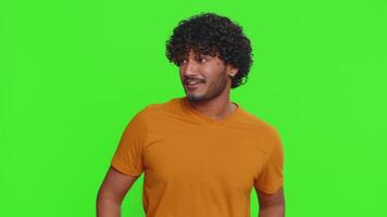 Ambitious satisfied egoistic indian man winner posing for photographers successful famous rich video