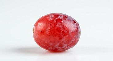 A red grape on a white background photo