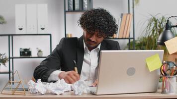 Angry furious man working at home office throwing crumpled paper, having nervous breakdown at work video