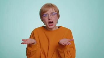 Woman raising hands in indignant expression ask why what reason of failure demonstrating disbelief video
