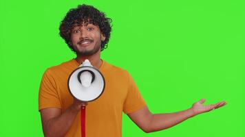 Man talking with megaphone, proclaiming news, loudly announcing advertisement pointing empty place video