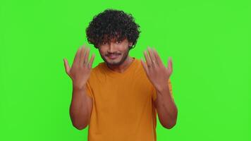 Man showing inviting gesture with hands, ask to join, beckoning to coming, gesturing hello goodbye video