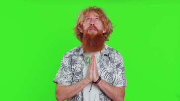 Caucasian sad man praying making wish, asking hopeful help, begging apology, meditation, imploring video