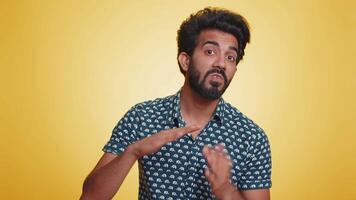 Tired serious upset indian man showing pause gesture, stop sign, time out, relax, break, deadline video