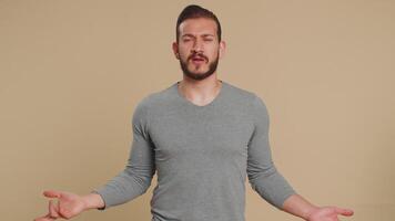 Man raising hands in indignant expression ask why what reason of failure demonstrating disbelief video