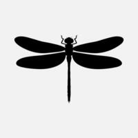 a dragonfly silhouette on a white background vector