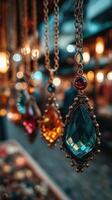 Colorful gemstone necklaces displayed in a market during twilight with warm lights in the background photo