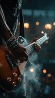Guitarist performing at an energetic concert with dramatic lighting and an enthusiastic crowd during the evening photo