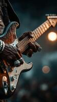 Guitarist performs passionately at a festival stage during sunset with audience in the background photo