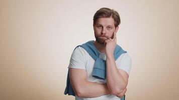 Tired bored man indifferent expression, exhausted of tedious story, not interested in communication video