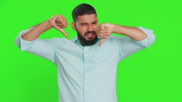 Upset man guy showing thumbs down gesture disapproval dissatisfied dislike negative feedback video