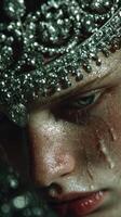 Portrait of a person adorned with intricate jewelry, capturing emotions and details in dim lighting photo