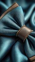 Stunning blue satin bow with intricate details on luxurious fabric elements and texture photo