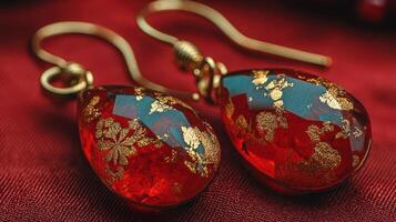 Jewelry featured in rich red color with golden accents showcasing intricate craftsmanship from a local artisan market photo
