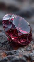 Sparkling ruby gemstone glistens on rocky surface with water droplets in natural light photo