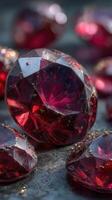Sparkling red gems illuminated by soft light on a textured surface reflecting their brilliance and beauty photo