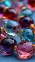 Colorful glass beads arranged closely in a decorative display showcasing their intricate designs and vibrant hues photo