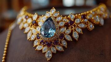 Exquisite gold necklace with blue and purple gemstones displayed elegantly on a velvet backdrop photo