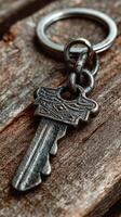 Vintage metal key resting on a worn wooden surface, capturing timeless detail and rustic charm in close-up view photo