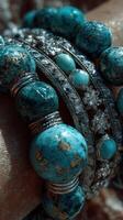 Intricately designed turquoise and silver bracelets showcase artisanal craftsmanship and vibrant color in a close-up view photo