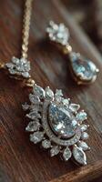 Elegant jewelry set featuring a sparkling necklace and matching earrings displayed on wooden surface photo